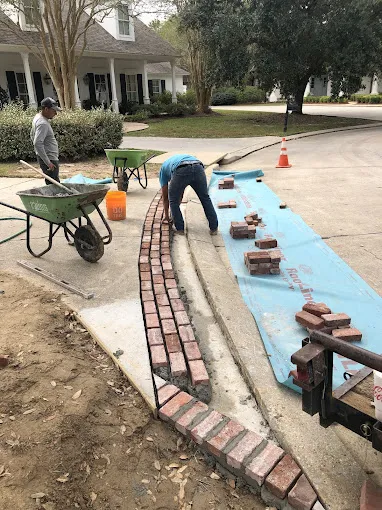 Evergreen Grounds Management Team working on a project